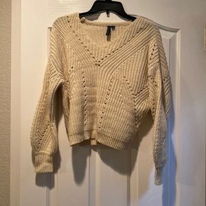 Moon & Madison cream colored junior v-neck sweater.